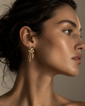 The Coquette Pearl Bow Studs